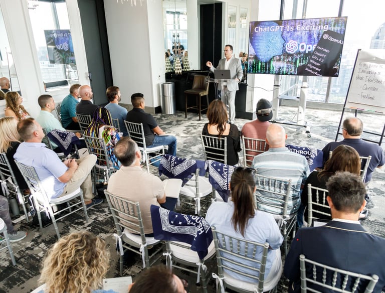 a group of people sitting in at a conference event planner