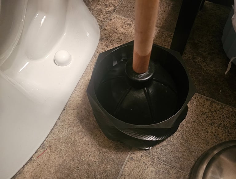 Helix Basin Black on bathroom floor.