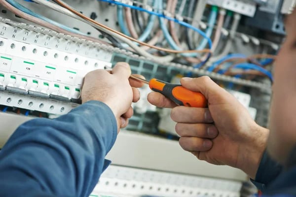 Electrician working on Electrical connections and MCBs