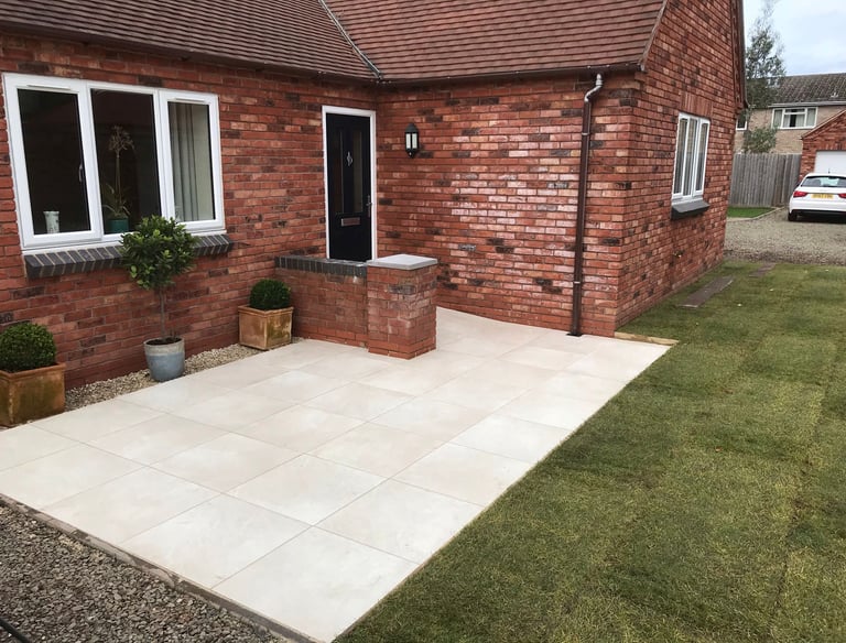 slabs in front garden, landscaping job carried out lakes building and plastering services