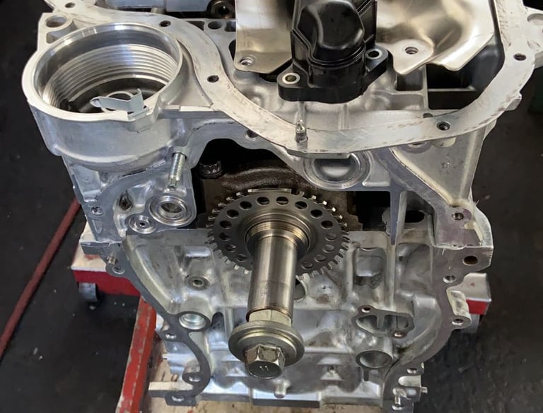 a car engine with a small engine in a garage