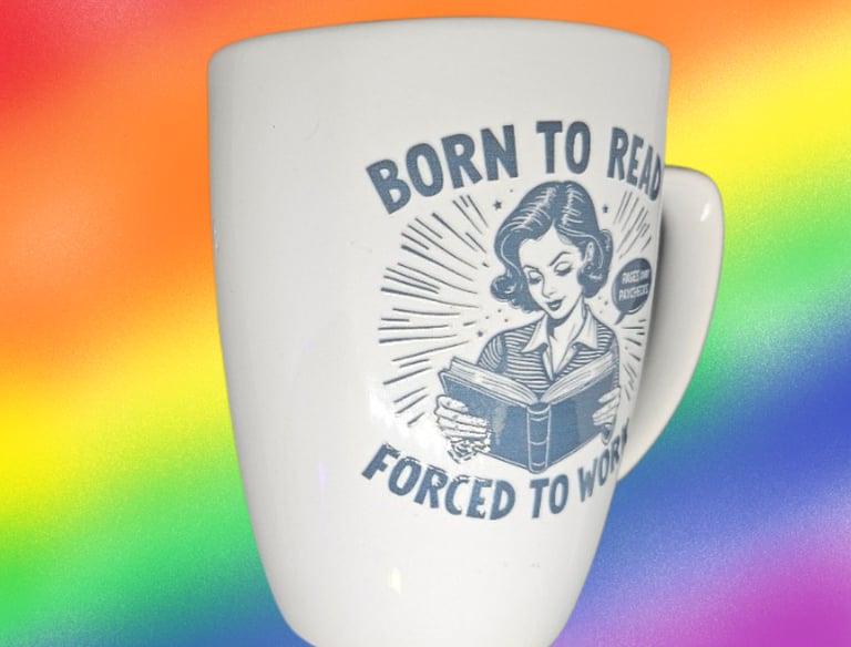 a mug cup of coffee with a woman reading a book