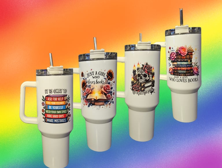a group of mugs with a rainbow colored background