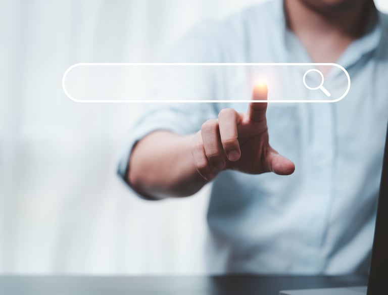A person pointing at a digital search bar icon to represent SEO and online data browsing.