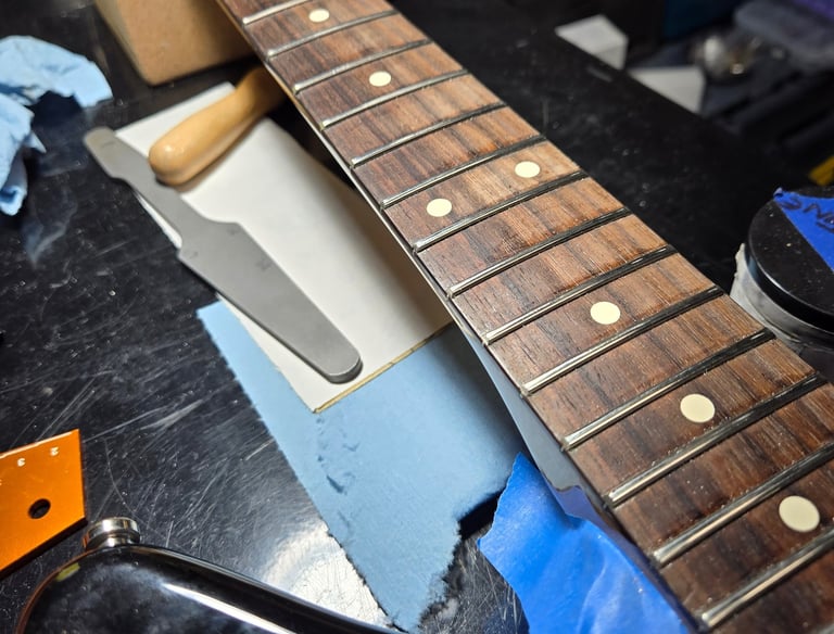 Guitar neck repair and fret replacement