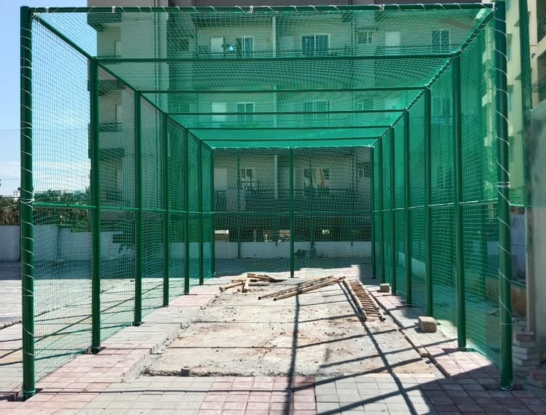 Wide view of a sports net installed on a local playground in Ahmedabad.