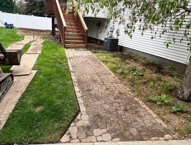 yard cleanup service removing leaves and debris