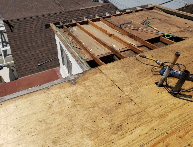 America Roofing crew performing roof repair in Alpine CA