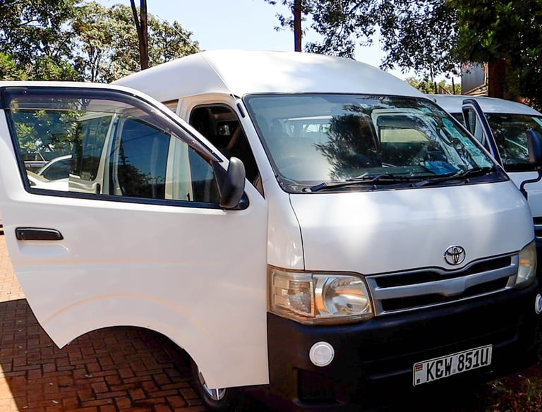 White Toyota Hiace passenger van for private van hire - Vanna Ventures