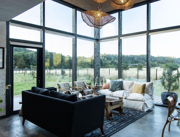 a living room with a couch and a table