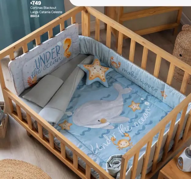 Cunero azul con estampado de ballena modelo Ballenita de la marca Vianney