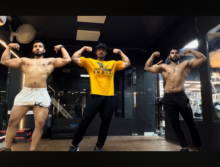 A focused coach checking physique and teaching how to pose for a bodybuilding show to his students.