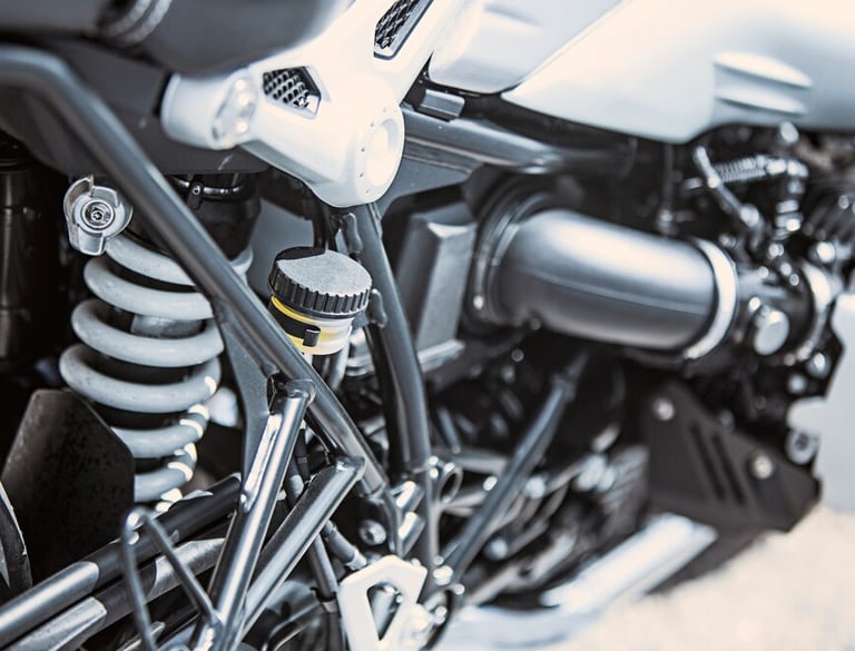 a motorcycle with a motorcycle in the background
