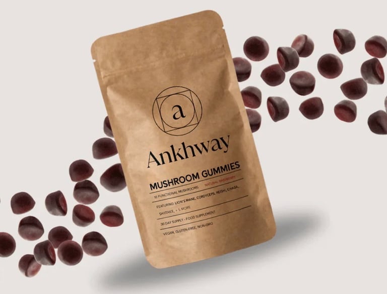 Ankhway mushroom gummies in a brown pouch surrounded by floating raspberry functional mushroom supplements.