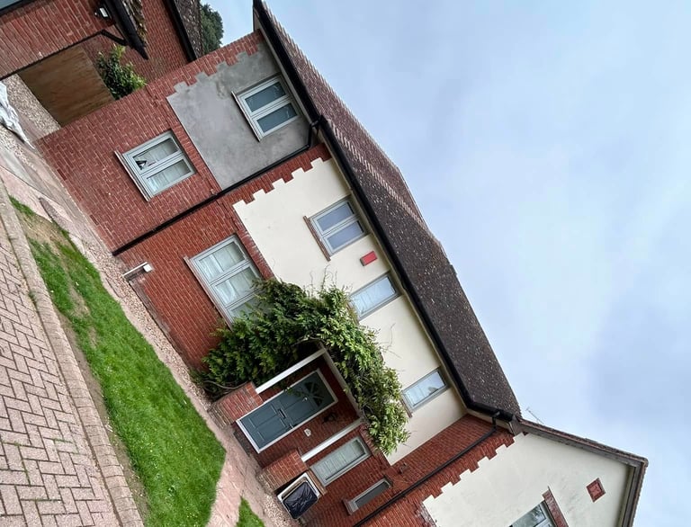 Rear house extension in Worcester with bi-fold doors and patio