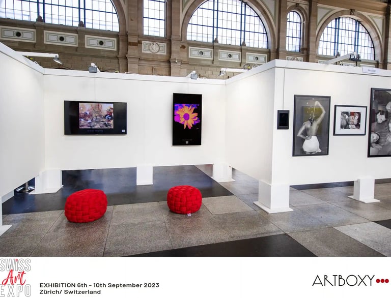 Art work hang on gallery walls for the Swiss Art Expo Exhibition in Zurich Switzerland