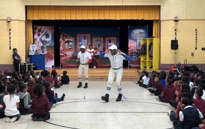 Discovery Theater performs during a school tour