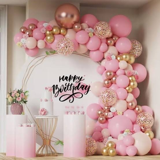 a birthday party with balloons and balloons