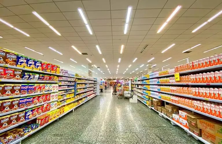 Retail supermarket aisle with energy-efficient linear and recessed LED lighting Victoria BC
