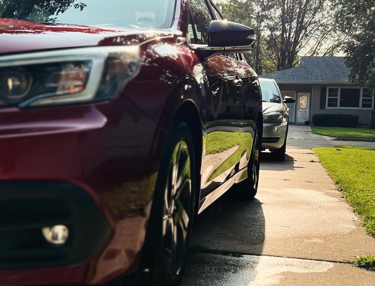 Professional mobile car wash removing grime and restoring a car’s shine