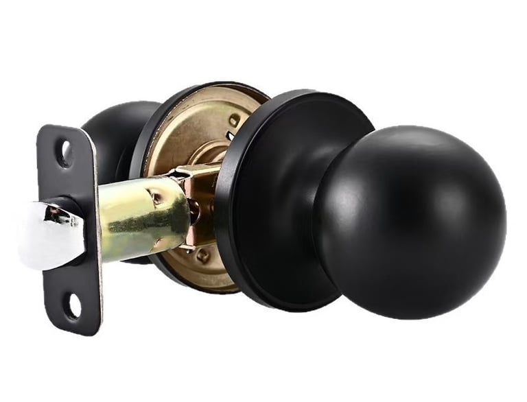 Matte black interior door knob set with latch mechanism for residential home hardware.