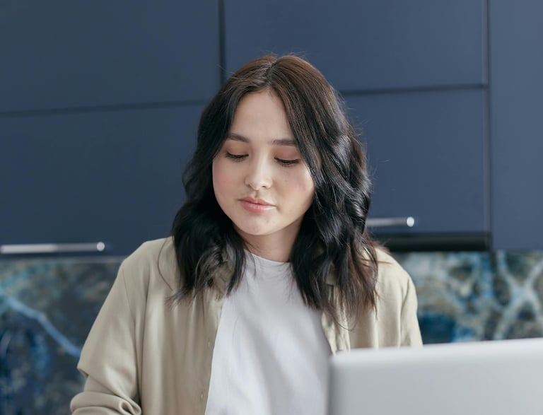 lady in office using her computer