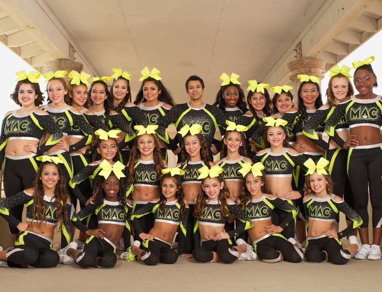 a group of cheerleaders posing for a photo