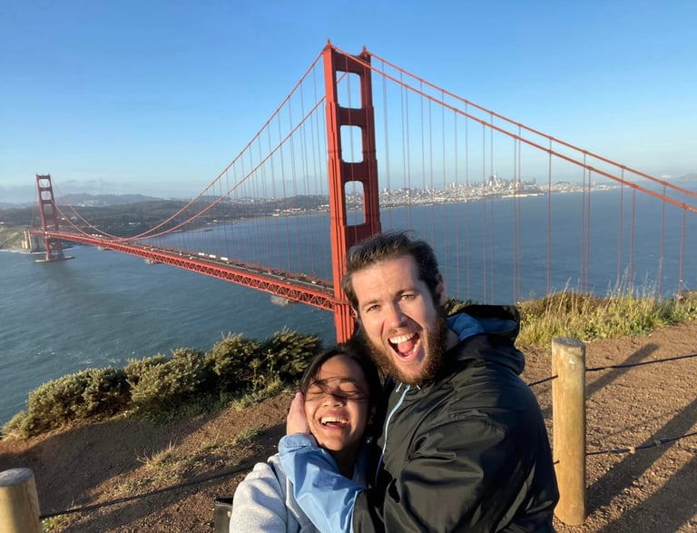 a man and a woman are taking a selfie