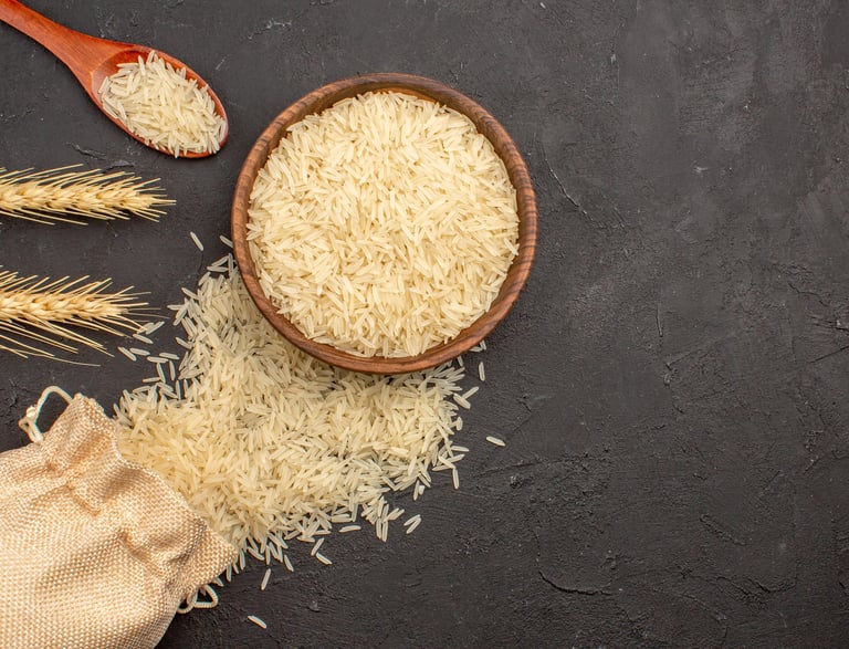 a bowl of rice with a beautiful long thin grain spread all across the image.