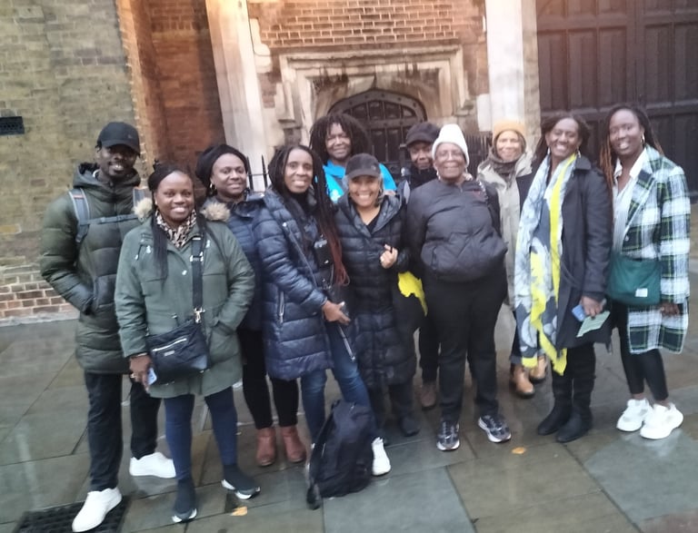 a group of people standing in front of St James's Palace