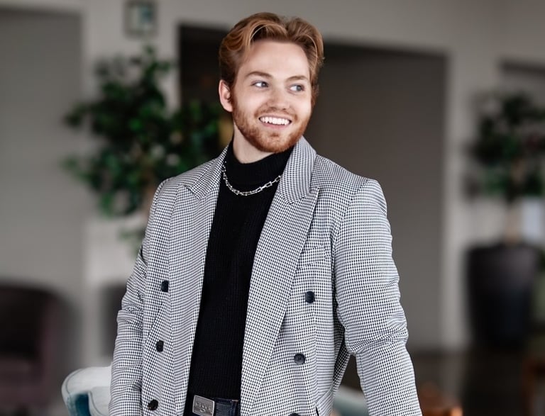 a man in a suit and a suit jacket