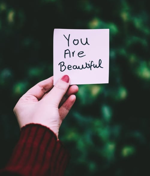lady hand hold sticky note you are beautiful