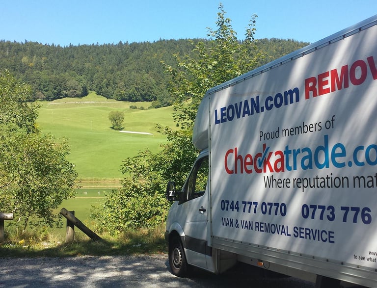 Leovan removals van parked in fields