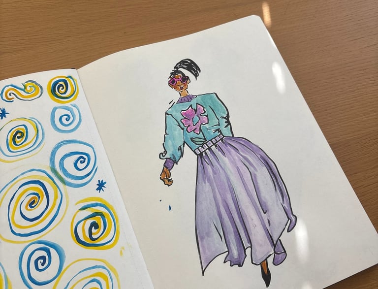 a book opened to show a drawing of a woman in a dress