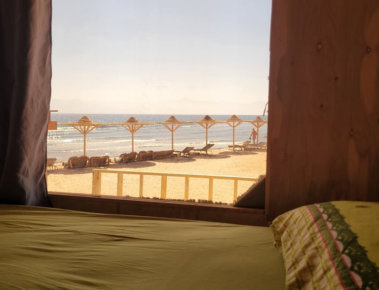 Sinai Life Camp beach view makeover Ras Shitan Nuweiba rooms and umbrellas by the Red Sea