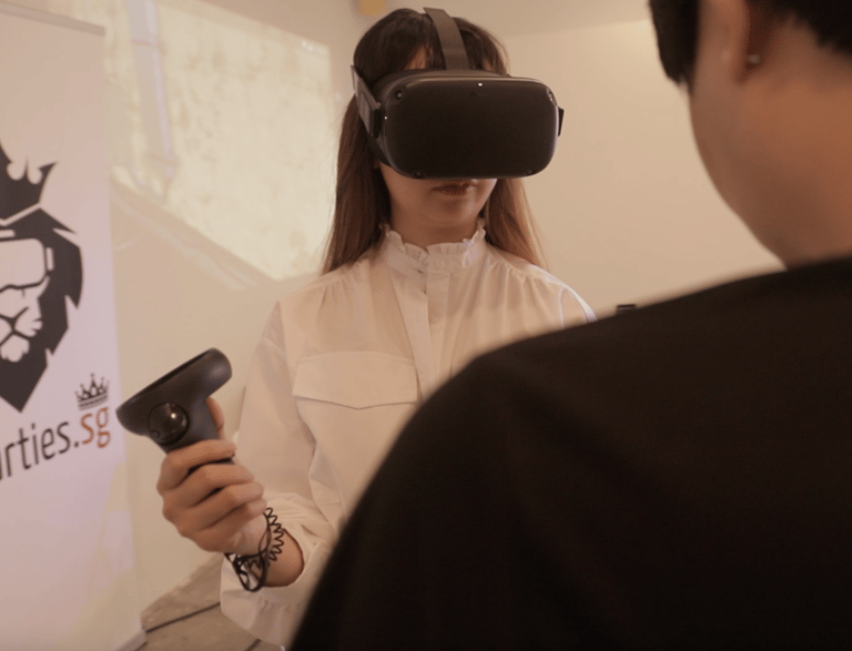 Woman practicing DJing in Virtual Reality at the affordable art fair Singapore