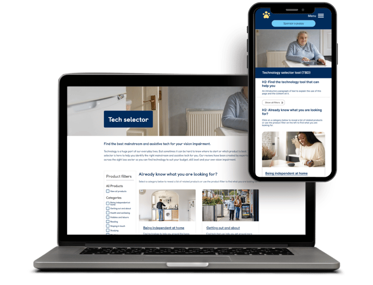 A laptop and smartphone displaying a responsive website design for assistive technology and vision impairment resources.