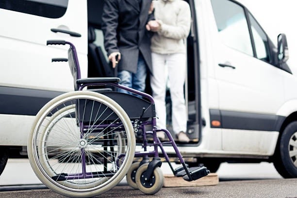 a wheelchair wheel chair with a wheel chair and a man in a wheelchair