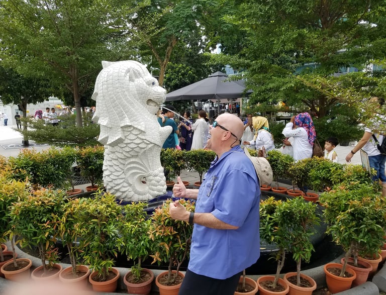 The Pirate stops for a drink at the smaller Merlion