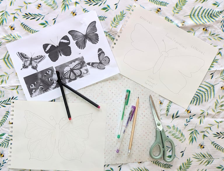 a pair of scissors and a pair of scissors on a bed