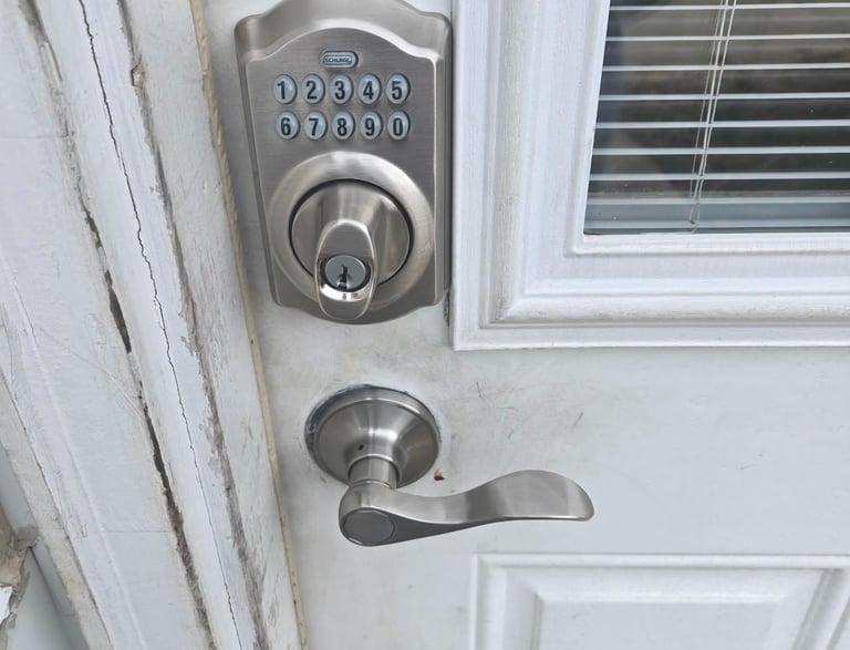 A white door with a keypad lock representing Jack’s Locksmith local keypad door lock services