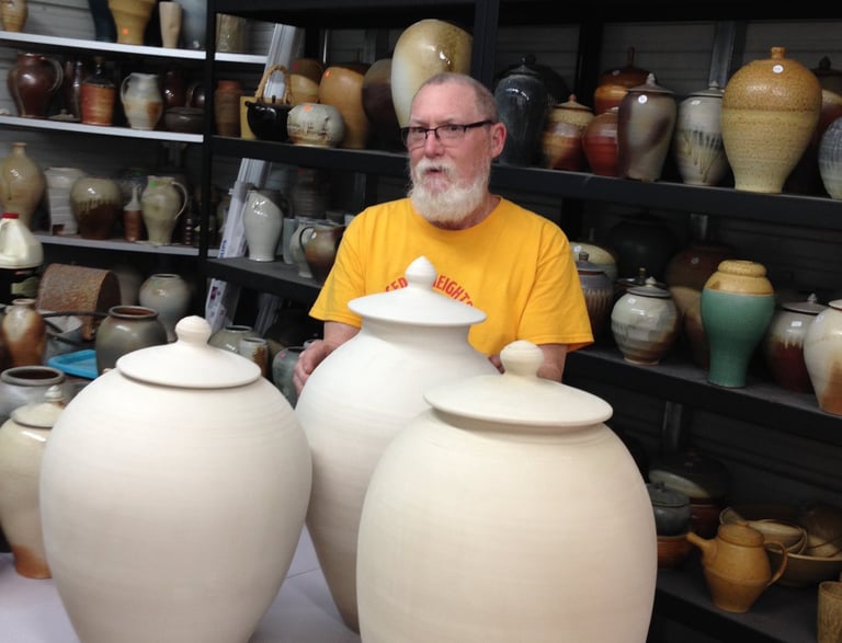 John McCoy with large pots