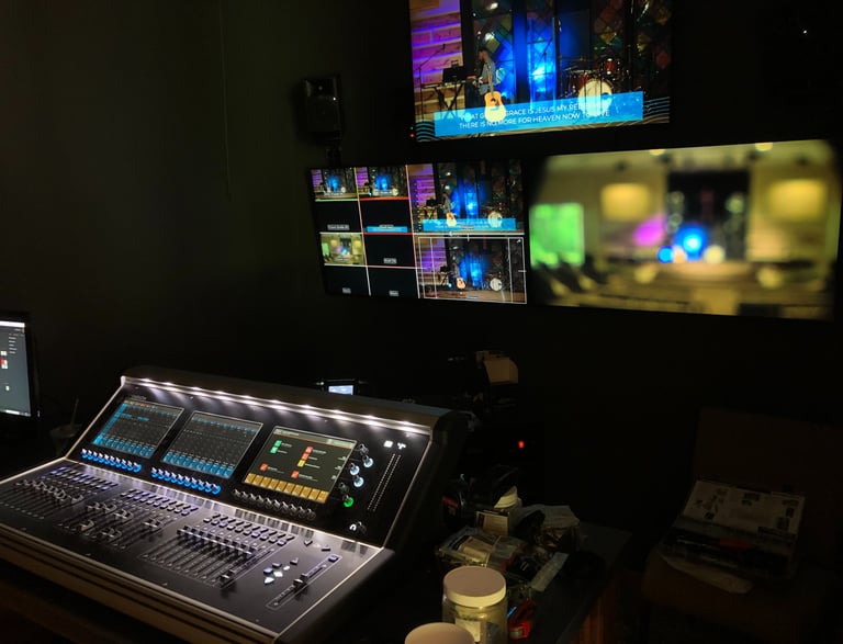 Digital console and monitors installed in broadcast suite in a church