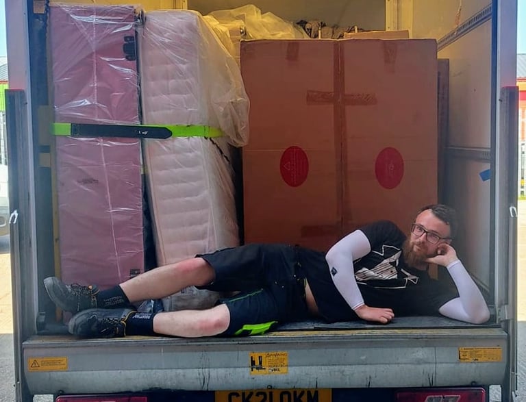 Me, stephen butler, in my uniform and the contents of Luton van