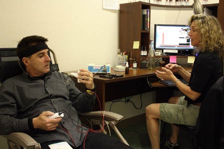 Man receiving a biofeedback treatment