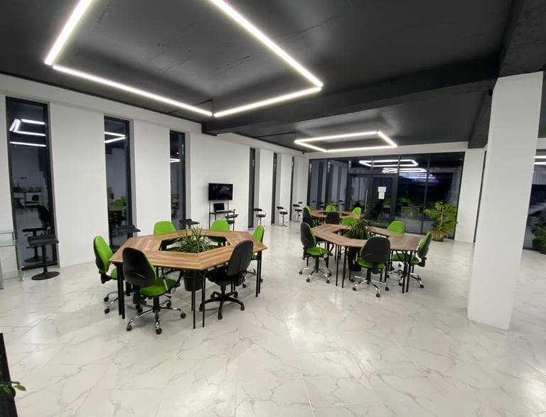 a conference room with a table and chairs