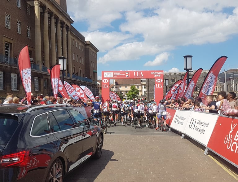 a group of athletes ready to start a race at a championships