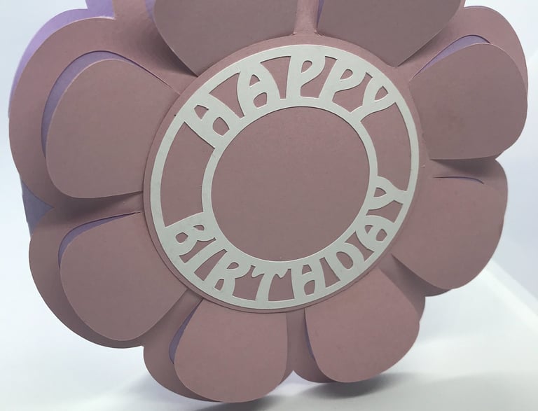A flower shaped birthday card 