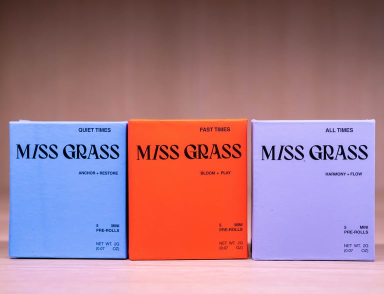 three boxes of miss grass