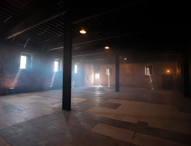Warehouse loft rental Los Angeles — Grayfox Studios industrial space with exposed brick, steel beams, and natural light